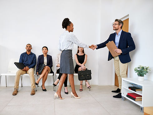 shot-of-a-group-of-businesspeople-seated-in-line-w-2022-12-13-23-38-33-utc.jpg