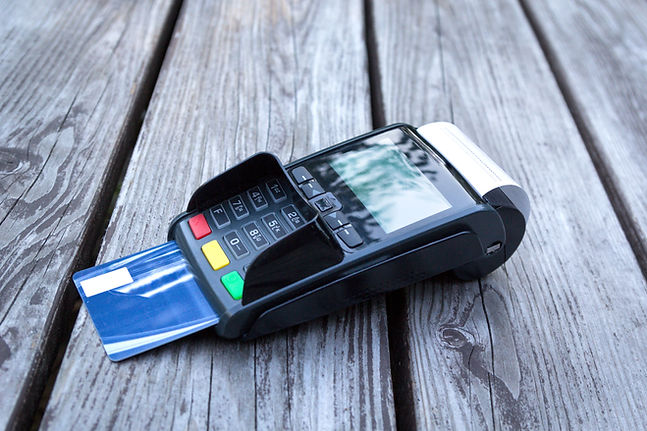 pos-terminal-hand-swiping-credit-card-payment-with-SGWXG8F.jpeg
