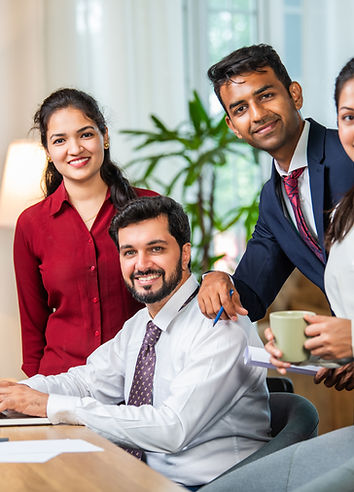 indian-young-businesspeople-using-laptop-in-group-2024-06-03-22-24-57-utc.jpeg