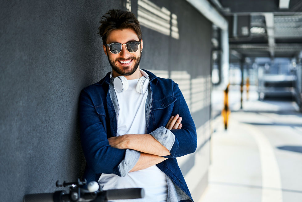 portrait-of-smiling-man-wearing-sunglasses-and-hea-2022-11-06-22-51-57-utc_edited.jpg