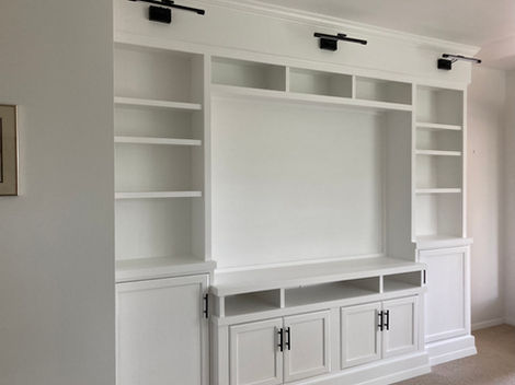 Built-in Bookshelf and Media Center with Remote-controlled Lights