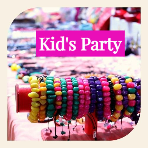 Colorful beaded bracelets in yellow, pink, and purple displayed on a rack, with blurred accessories in the background – highlighting fun and creative kids’ bracelet-making parties at National Harbor