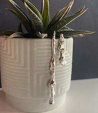 Alléro Jewellery's handmade recycled organic twiglet asymmetrical earrings, hand forged