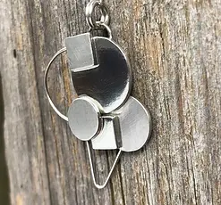Finished handmade matte and polished recycled sterling silver geo pendant