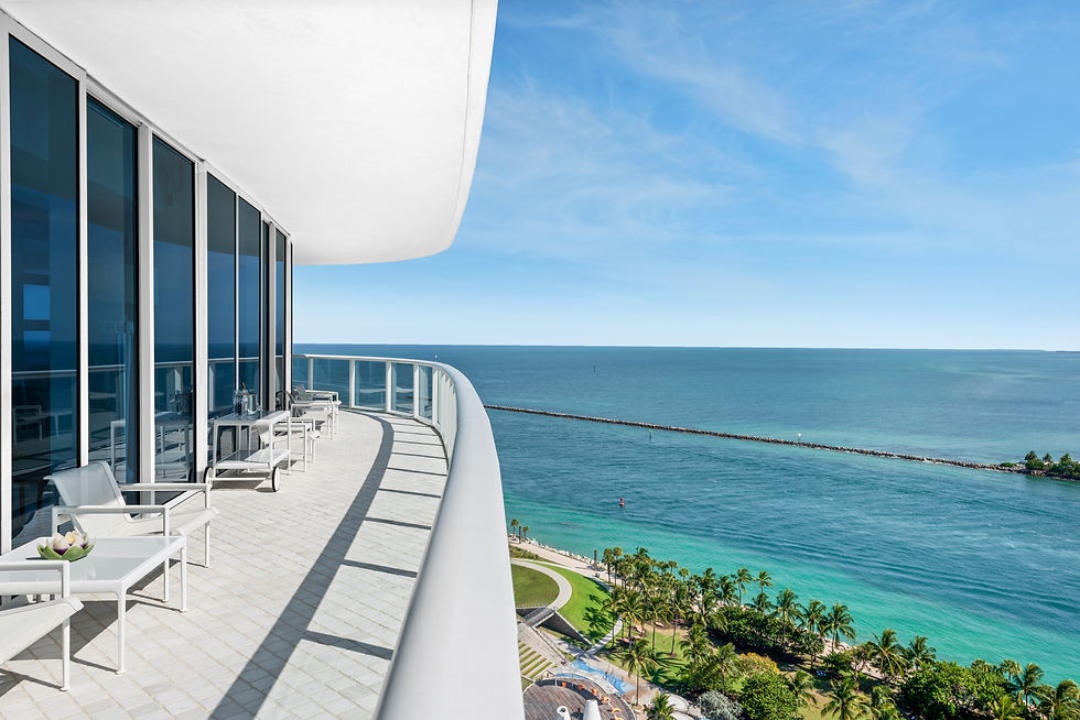 Liquid Kynar finished Sliding glass doors, storefront panels, and railings in Miami Beach