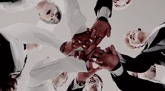 Full group seven members BTS Bangtan group shout before concert from below hands together gif of RM Kim Namnjoon Rap Monster V Kim Taehyung Kim Seokjin Jin Jung Hoseok J-hope Hobi fairy Park Jimin Jeon Jungkook JK Suga Agust D Min Yoongi