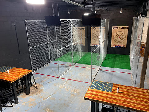 The interior of an axe throwing range.