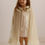 Thumbnail: White and gold tulle cape