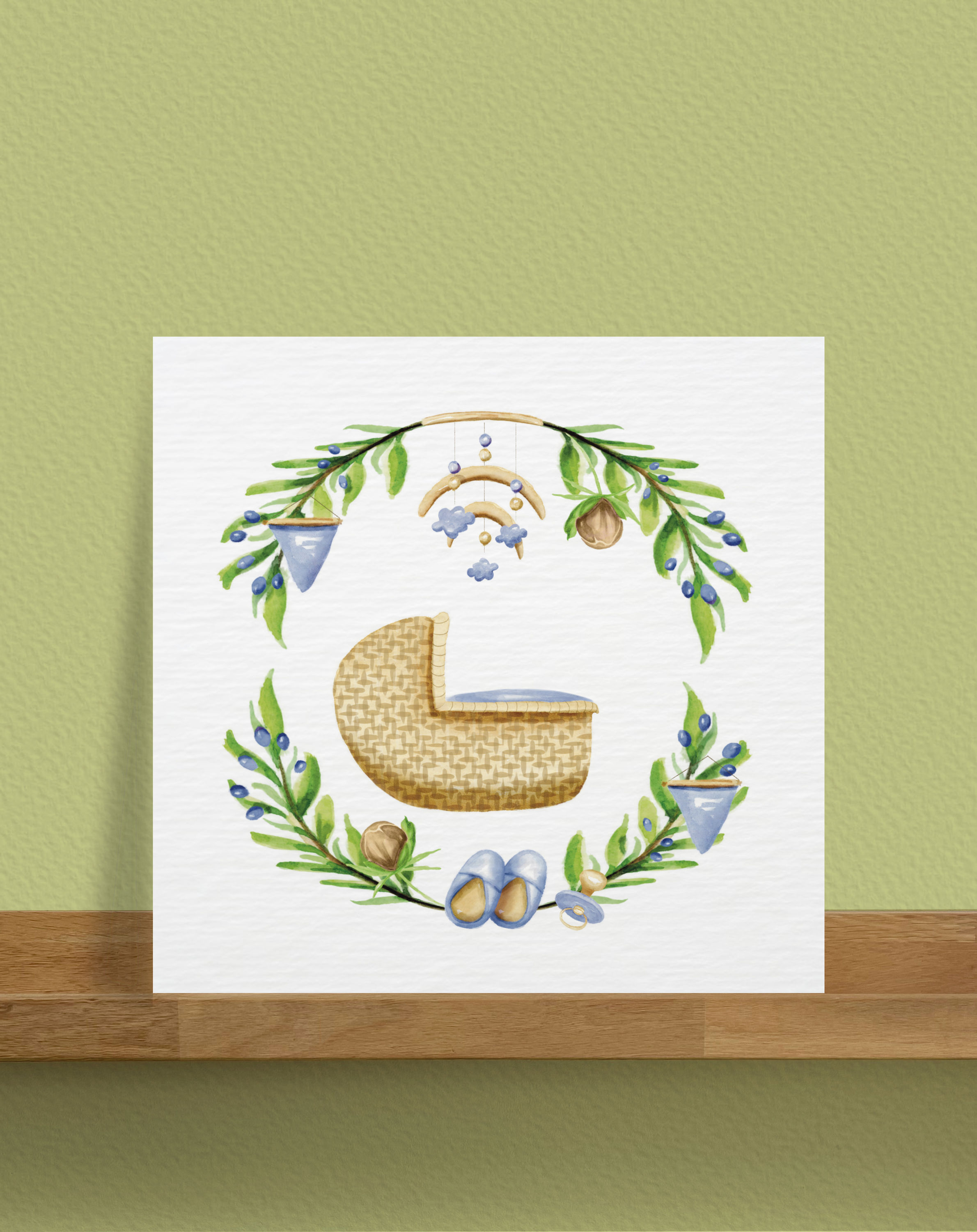 Ansichtkaart van wiegje in een cirkel van blaadjes gemaakt met waterverf