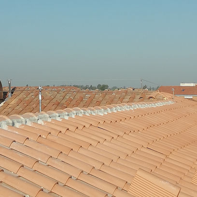 Lavori su tetto con guaine e riposizionamento coppi