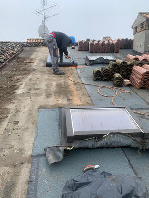 Lavori su tetto con guaine e riposizionamento coppi