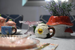 Pink cake stand with toddler sized mini teapot