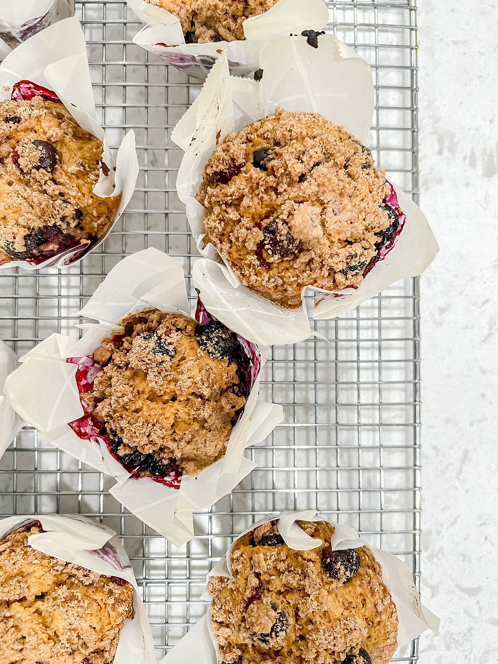 blueberry muffins on a wire rack