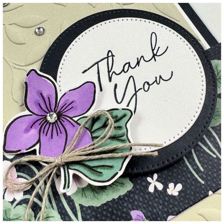 Close-up of a Stampin' Up! Framed Violets thank you card with layered violet flower.