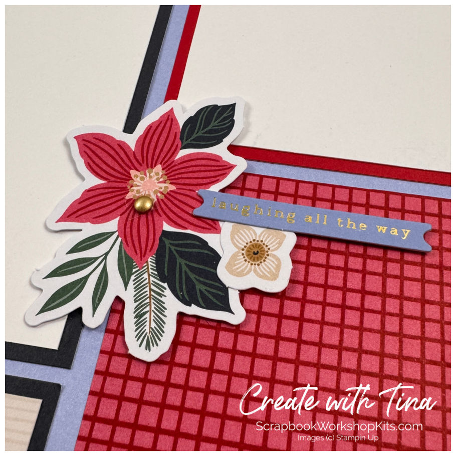Poinsettia ephemera with a “Laughing All the Way” sentiment, red patterned paper and gold accents on a Christmas scrapbook pa