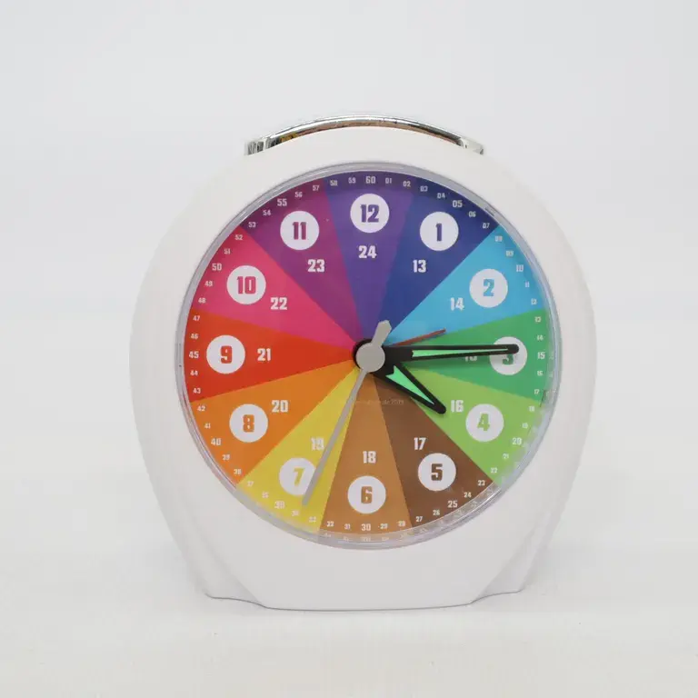Leiser Regenbogen Funkwecker von rainbowatch© im weißen Acrylgehäuse mit 24-Stunden-Anzeige und 60-Minuten-Skala