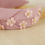 Miniatura: Diadema nudo flores rosa palo