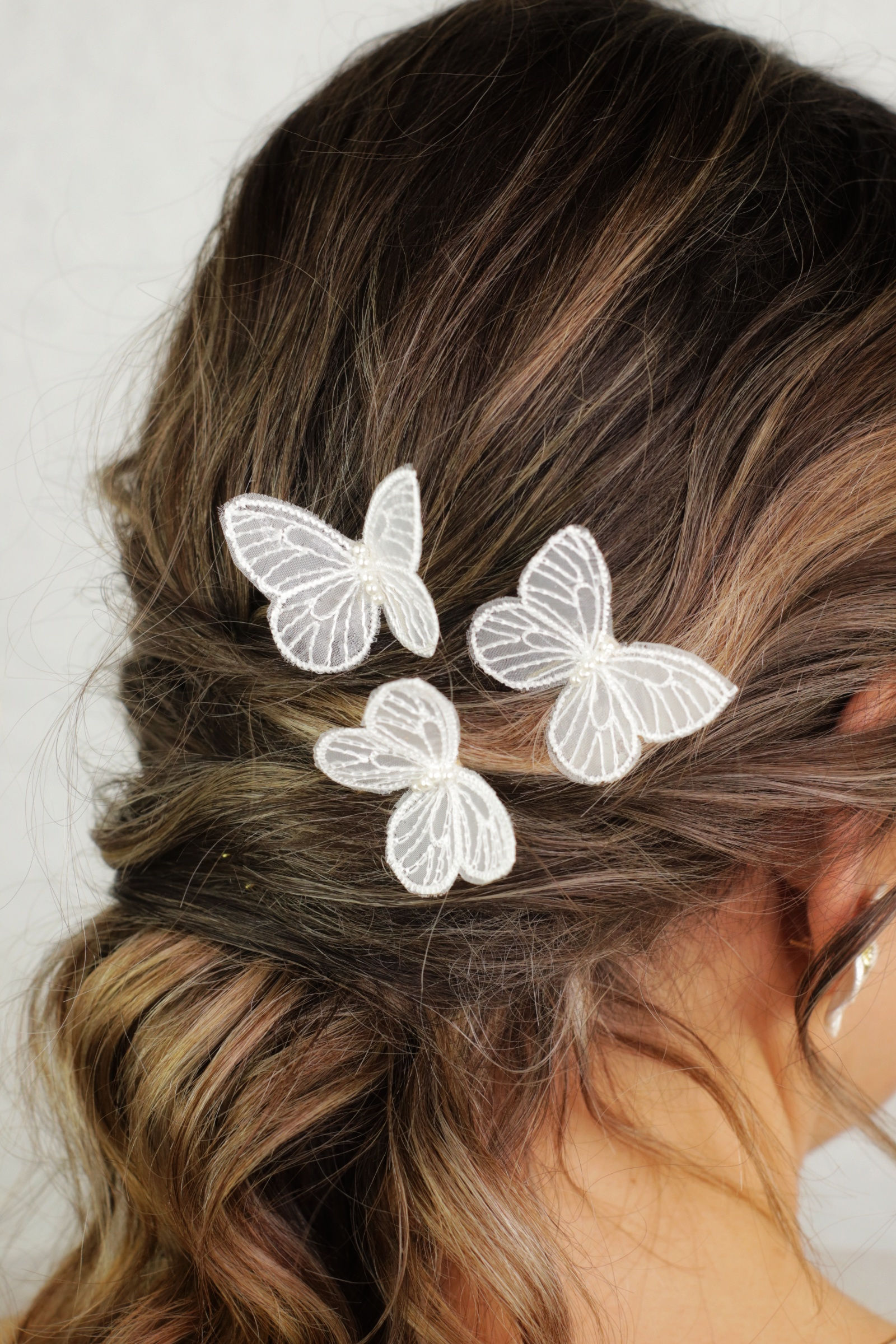 Trío mariposas blancas