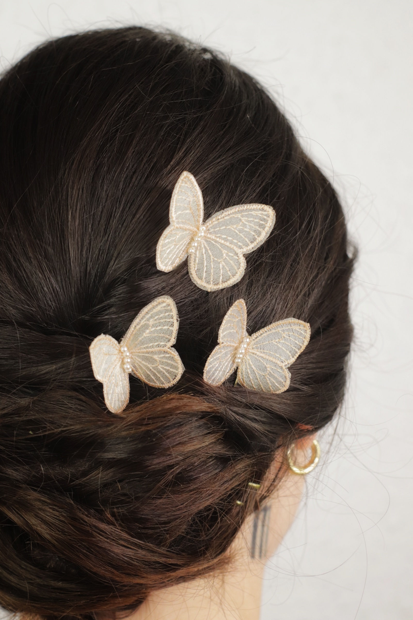 Trío mariposas tostado