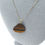 Thumbnail: Carved Tiger Eye Shell Pendant Necklace