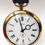 Thumbnail: Vintage Smiths Gold Wind Up Pocket Watch close up