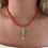 Thumbnail: Orange Fish Necklace