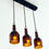 Thumbnail: Repurposed Amber Whiskey Bottle Chandelier | Kitchen & Bar Lights