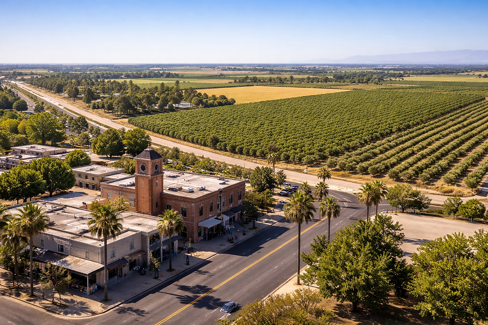 Shafter California agricultural landscape with orchards, farmland, and small town streets under clear sunny skies