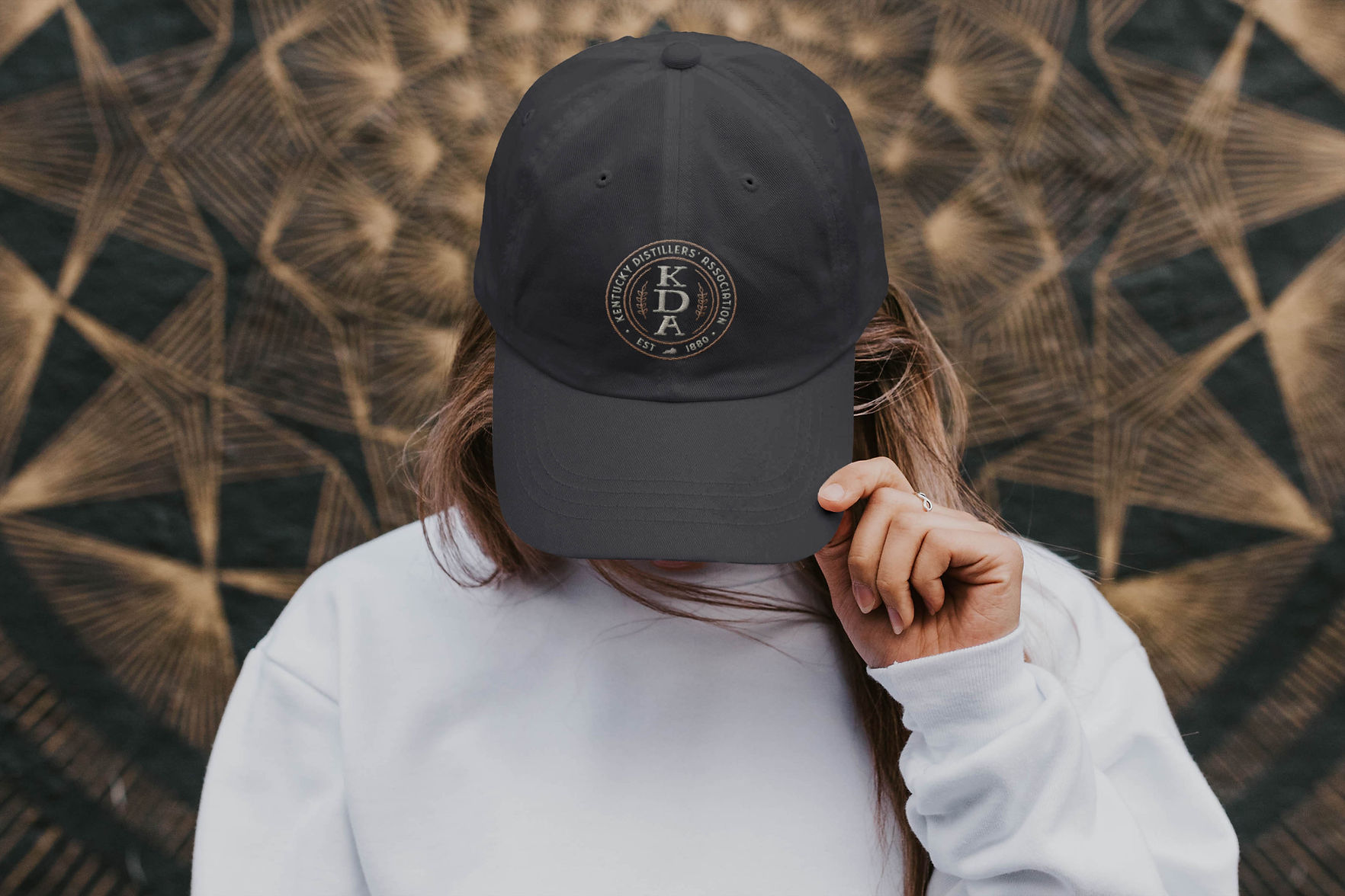 Woman in Hat with KDA Logo