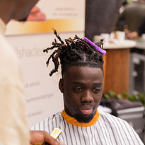 Client doing his hair.jpg