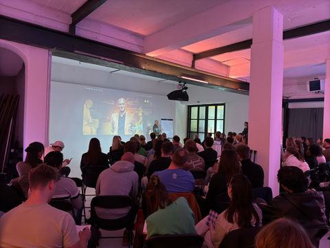 Workshop setup at The Loft Antwerp, with participants engaged in hands-on learning in a sleek, adaptable environment.
