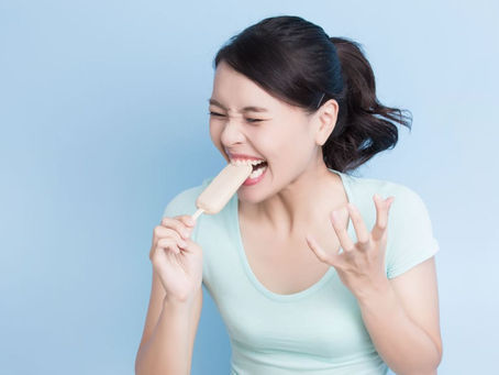 Why Are My Teeth Sensitive? Causes and Treatment Options