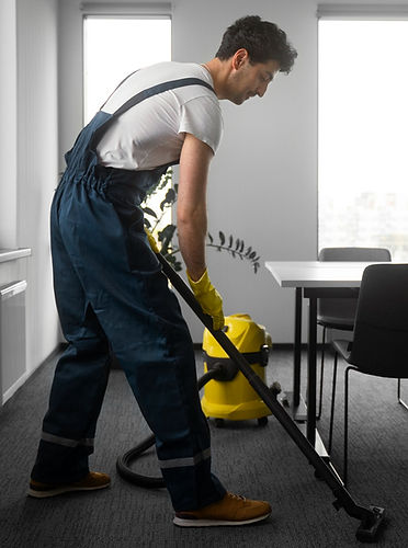 full-shot-man-cleaning-indoors_edited.jp