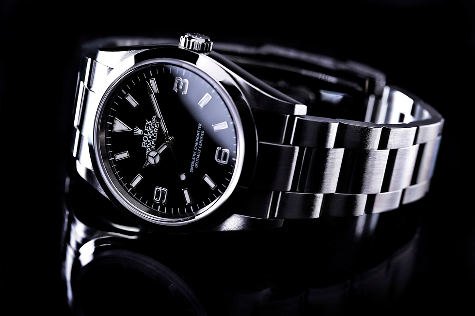 Swiss Rolex Explorer watch with black dial and steel bracelet