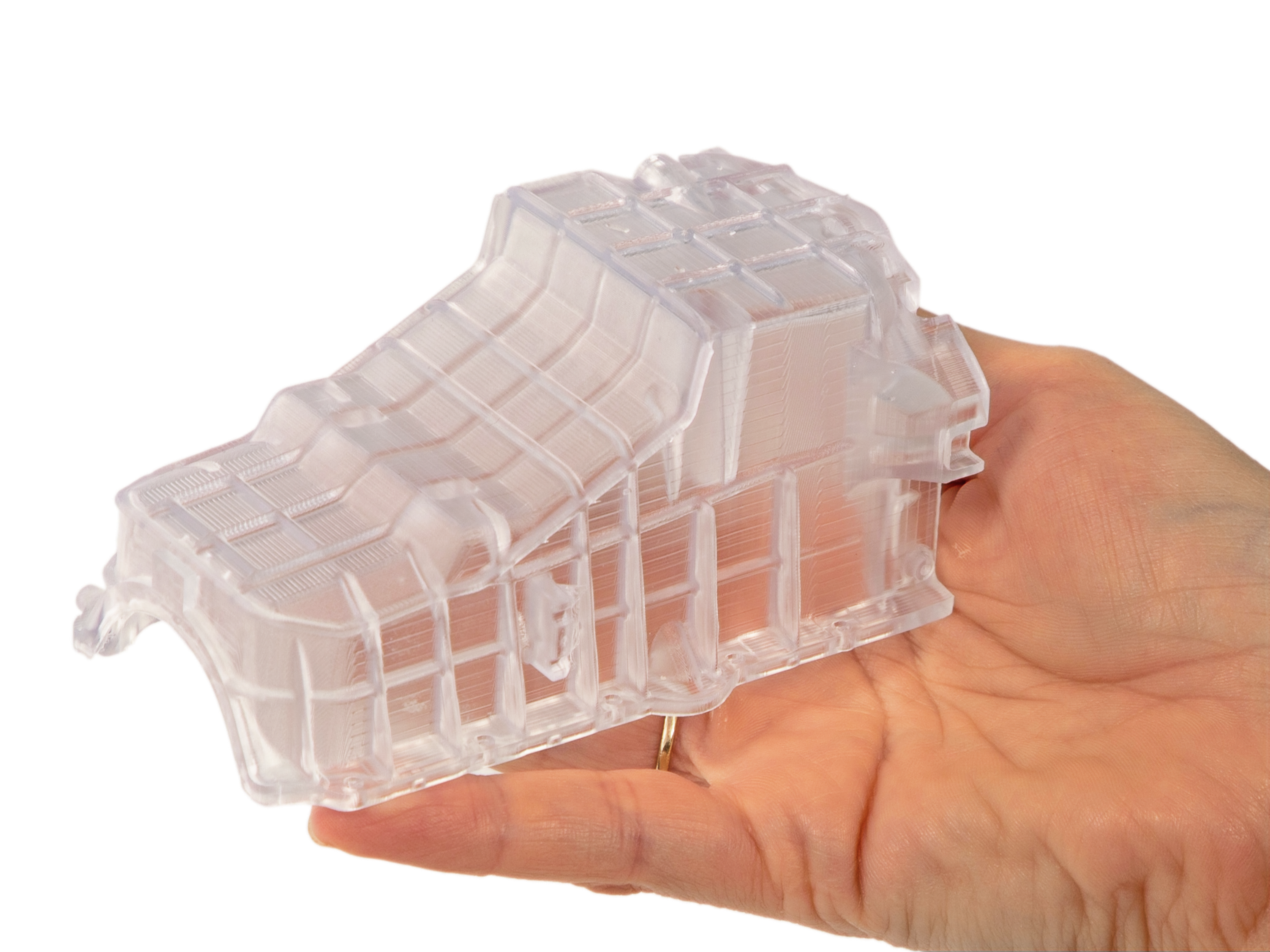 3d-systems-figure-4-tough-clear-oil-pan-cover-in-hand-1-300ppi_edited_edited.png