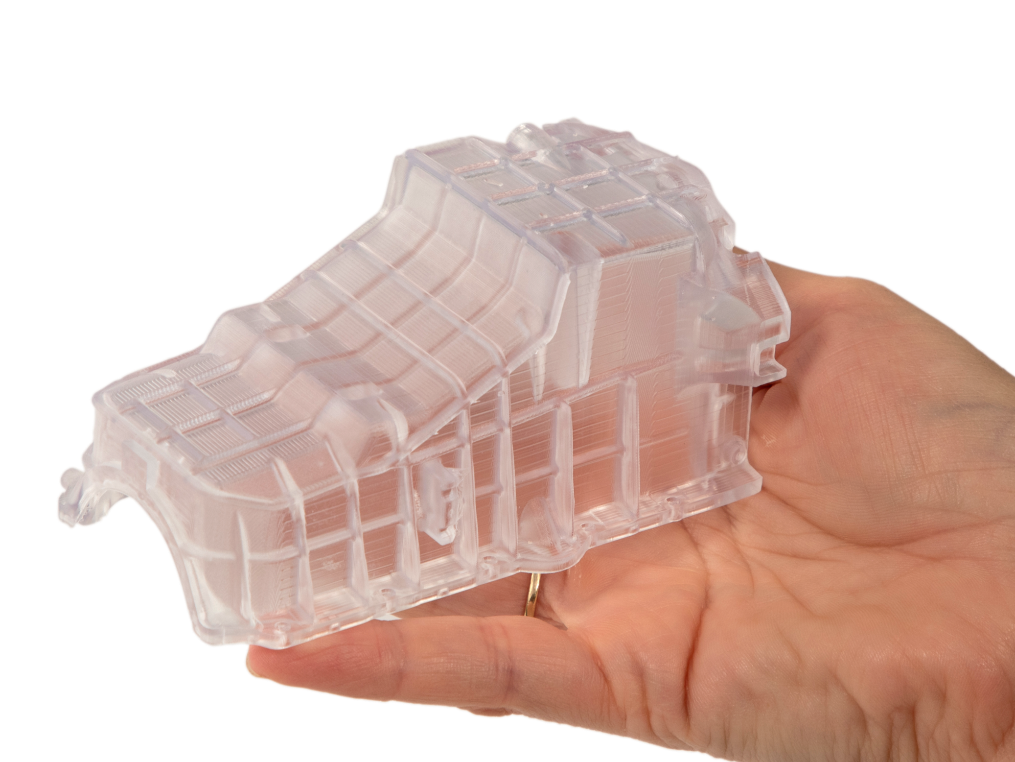 3d-systems-figure-4-tough-clear-oil-pan-cover-in-hand-1-300ppi_edited_edited.png