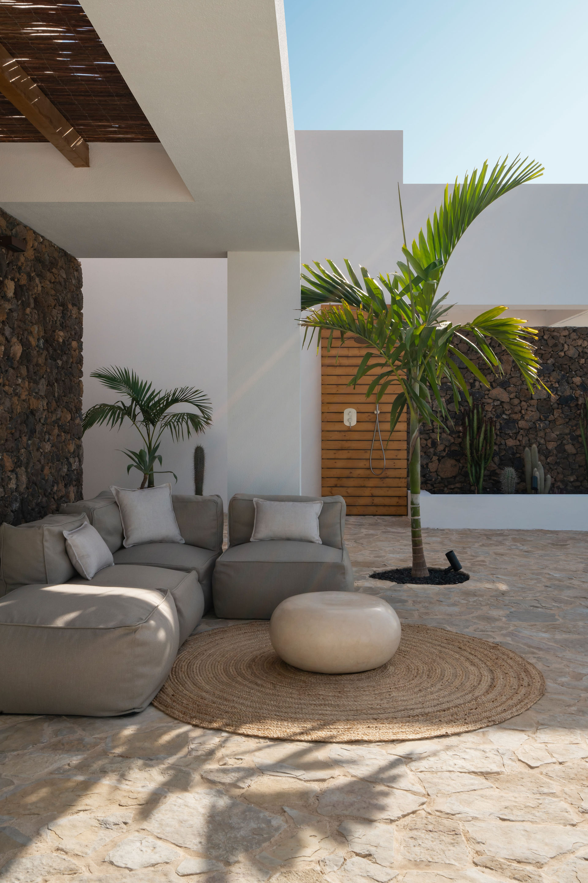 Outdoor modular sofa, moroccan style coffee table, terrace design for a Villa with pool in La Capellania, Tamaragua, El Palmeral, Corralejo by interior designer Noogar.