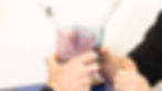 Two glasses and straws toasting