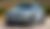 Процесс профессиональной замены моторного масла в автомобиле Volkswagen. Механик сливает отработанное масло, демонтирует старый масляный фильтр и устанавливает новый, затем заливает свежее масло, соответствующее требованиям VW. На фоне — подъемник и оборудование сервиса, подчеркивающие качество и точность технического обслуживания