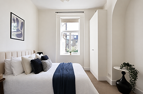 Staged bedroom in a one-bedroom flat in Hammersmith
