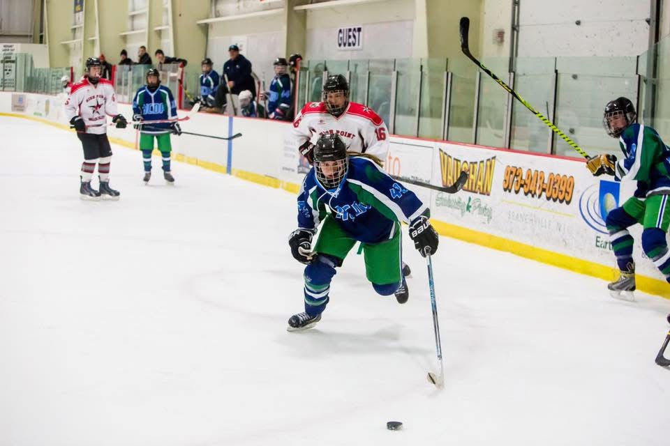 High school girl hockey player on a coed team