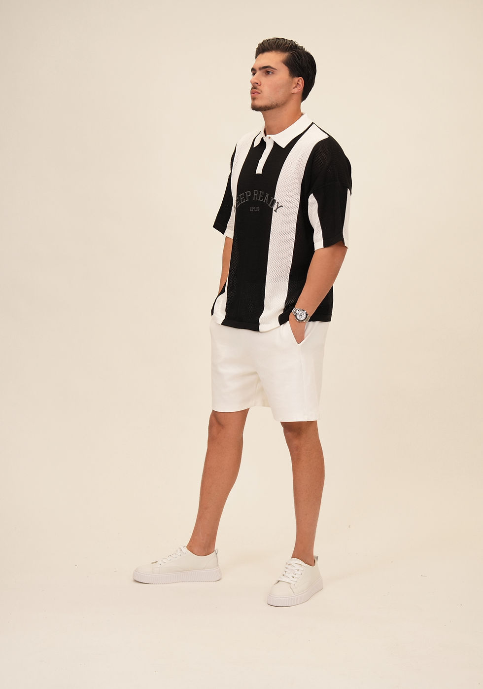 תמונה ממוזערת: חולצה פולו אוברסייז מבד רשת 