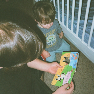 Everyday family moments documented on a Kodak H35 film camera, featuring candid scenes at the grocery store, around the house, and out to eat.