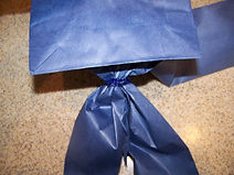 Kidfunideas.com paper plate snowman craft picture of making the scarf step 3