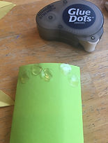 Kidfunideas.com summer sunflower picture of attaching glue dots to the stem of the flower