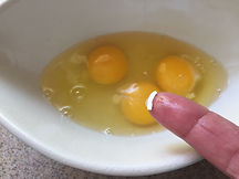 Kidfunideas.com tip: remove egg shell from a bowl easily by wetting your finger with water first.