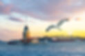 Istanbul Maiden Tower (kiz kulesi) with seagull and summer yellow sky with sun and clouds