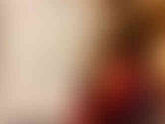 Image of Iris from behind, looking at a whiteboard with some 2024 reflection written down on it.