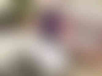 Iris admiring the 1st Alta toolkit while sitting at a coach, going through the intro booklet