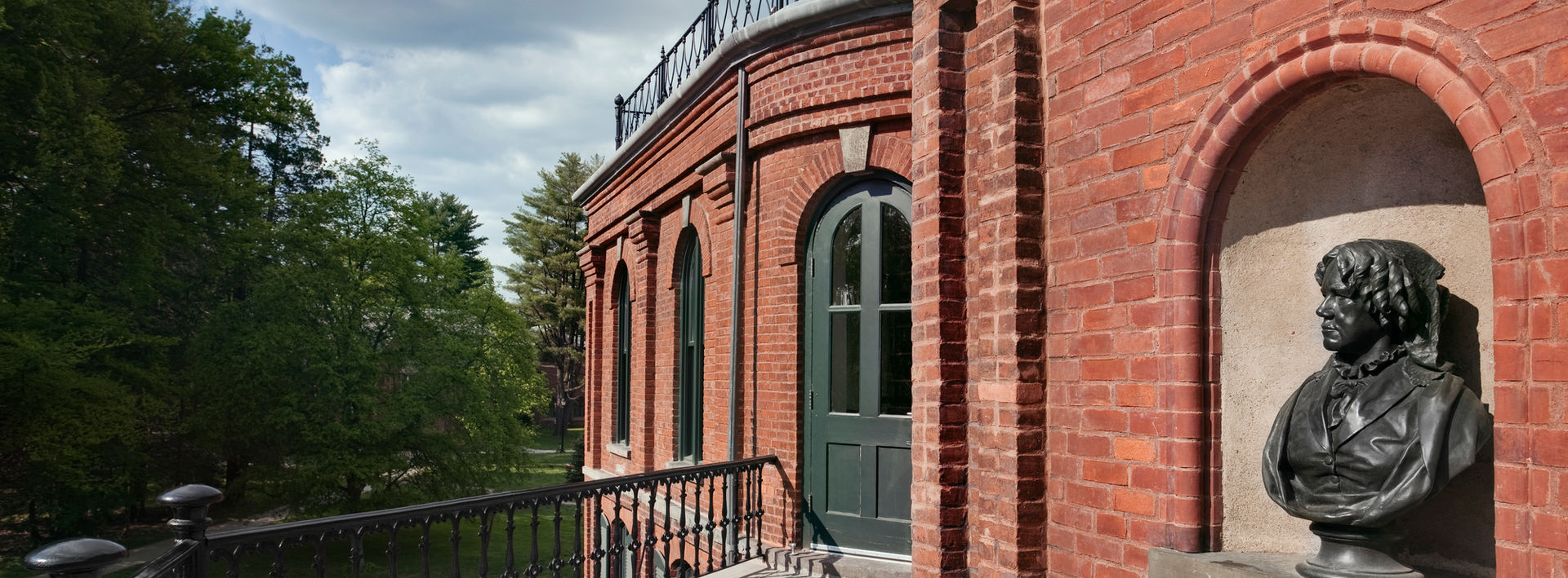 Light-filled corridor at Vassar College with integrated lighting and historic finishes
